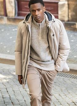 Parka larga en beis con capucha